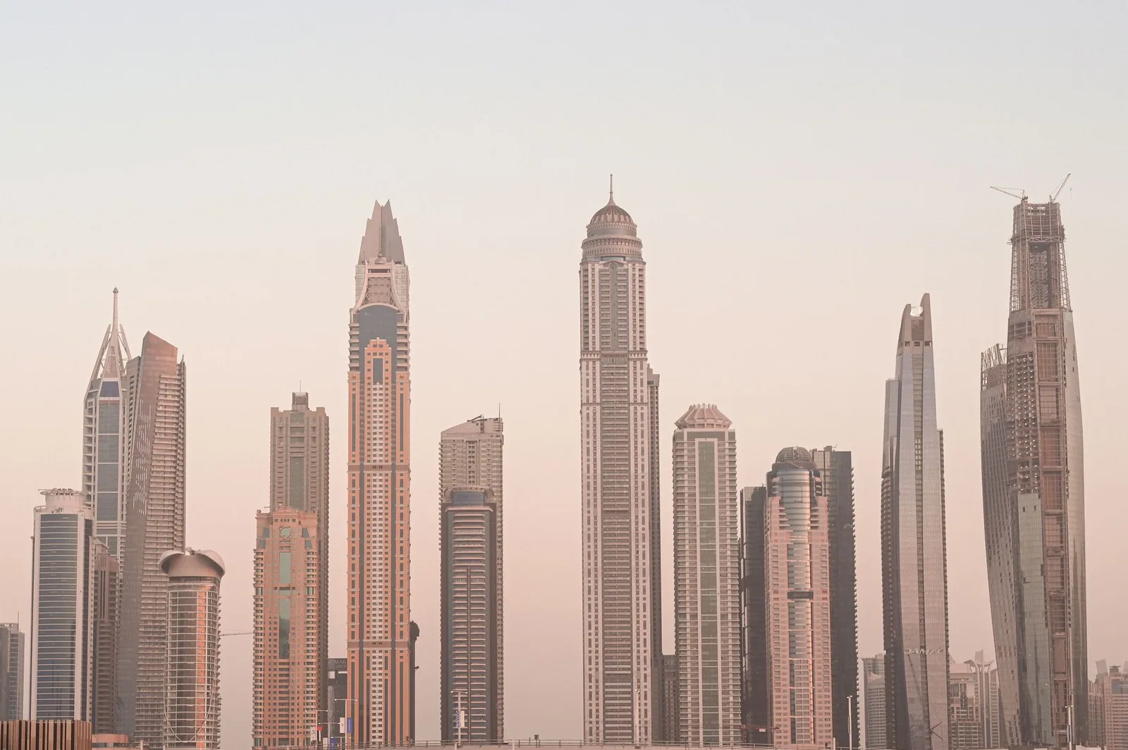 A real photograph of Dubai skyline at dusk