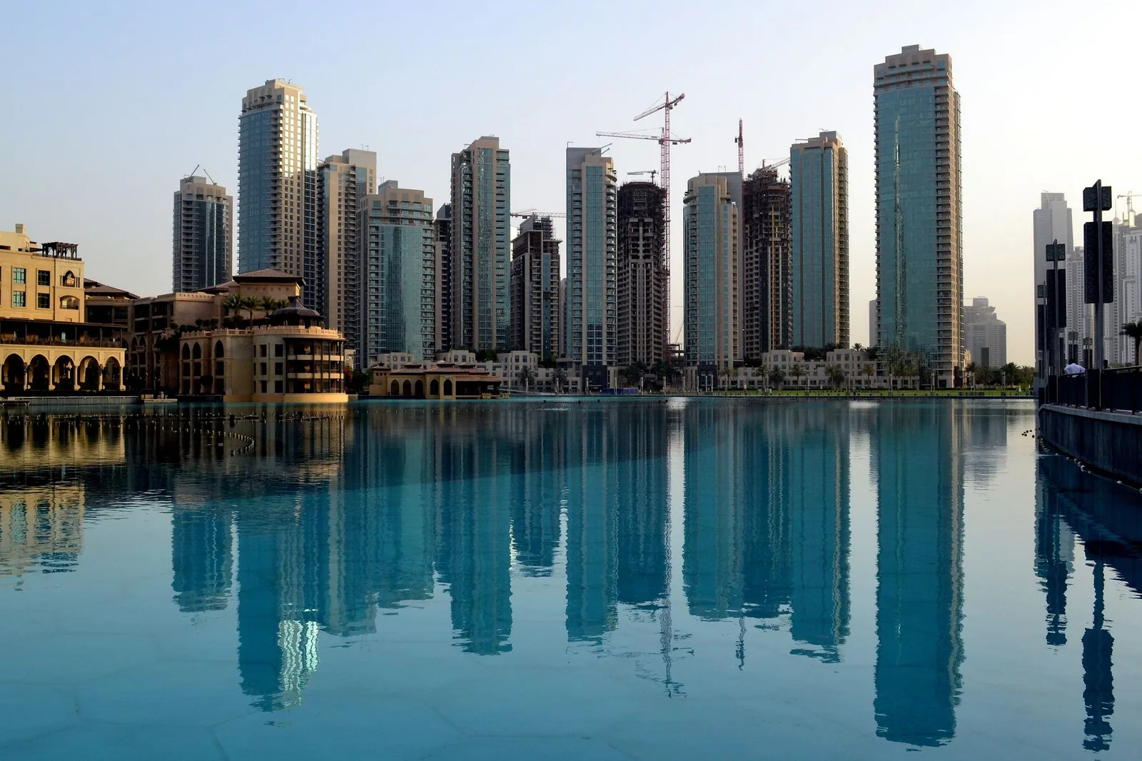 Real Dubai buildings reflected in water