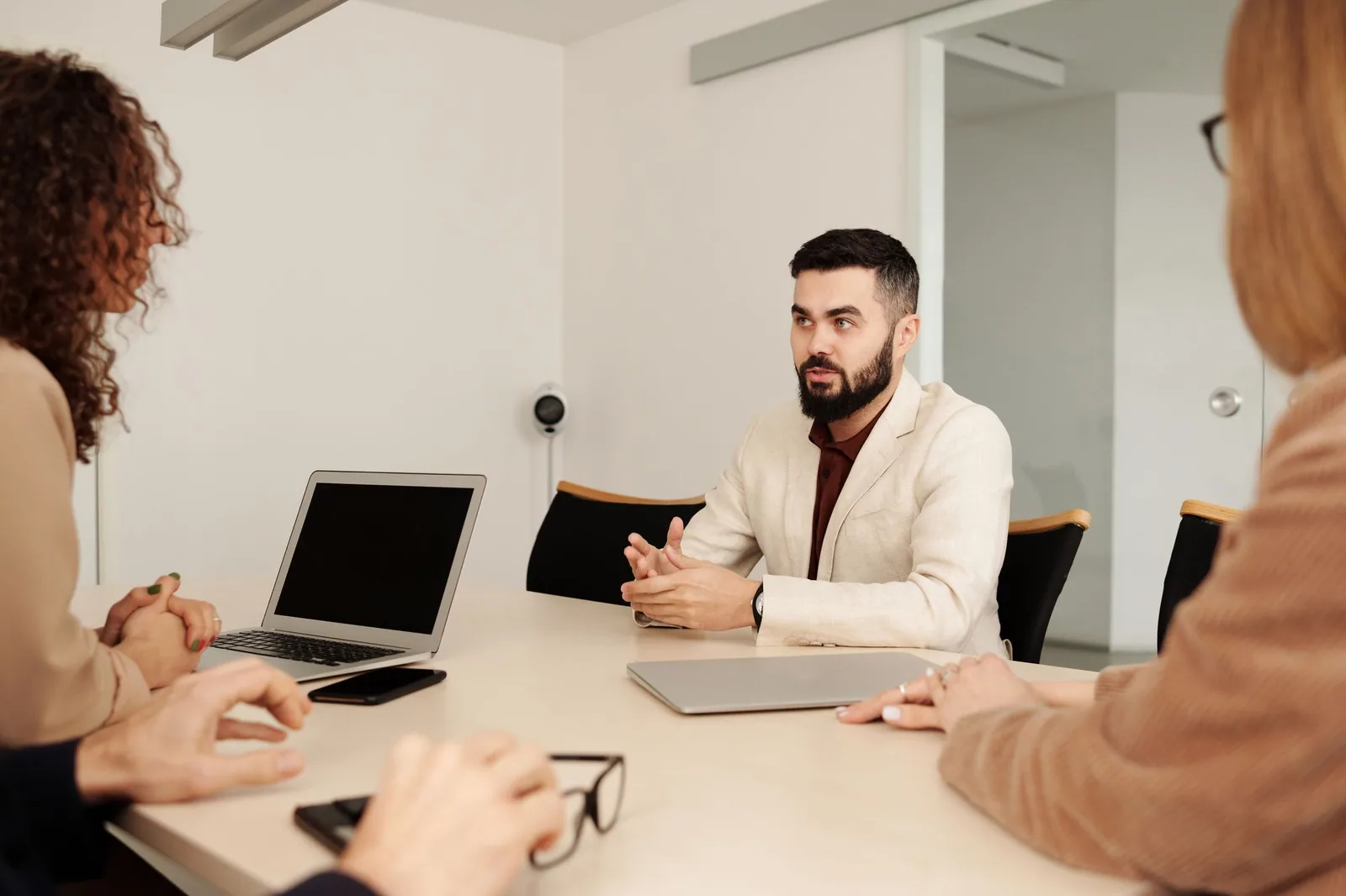 Professional colleagues discussing business records